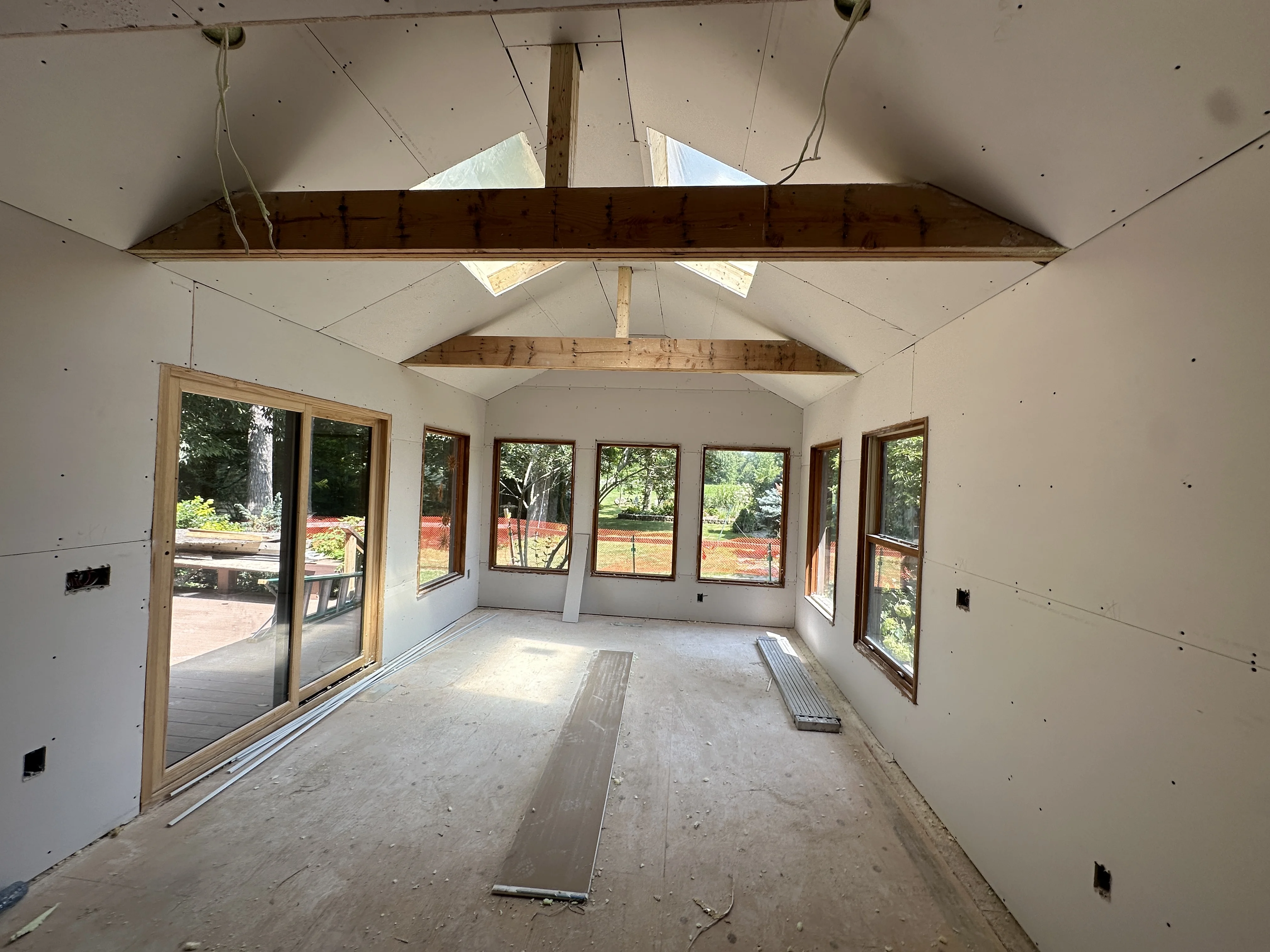 Vaulted Sunroom Drywall Exposed Beam Skylights